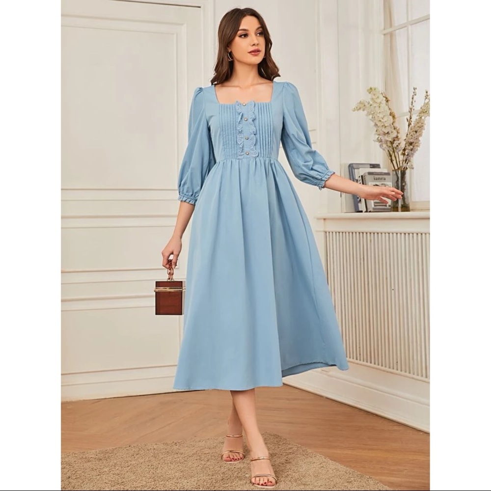 Light blue embroidered dress